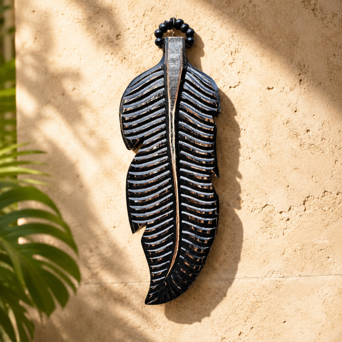 Carved Feather Wall Hanging — Ebony